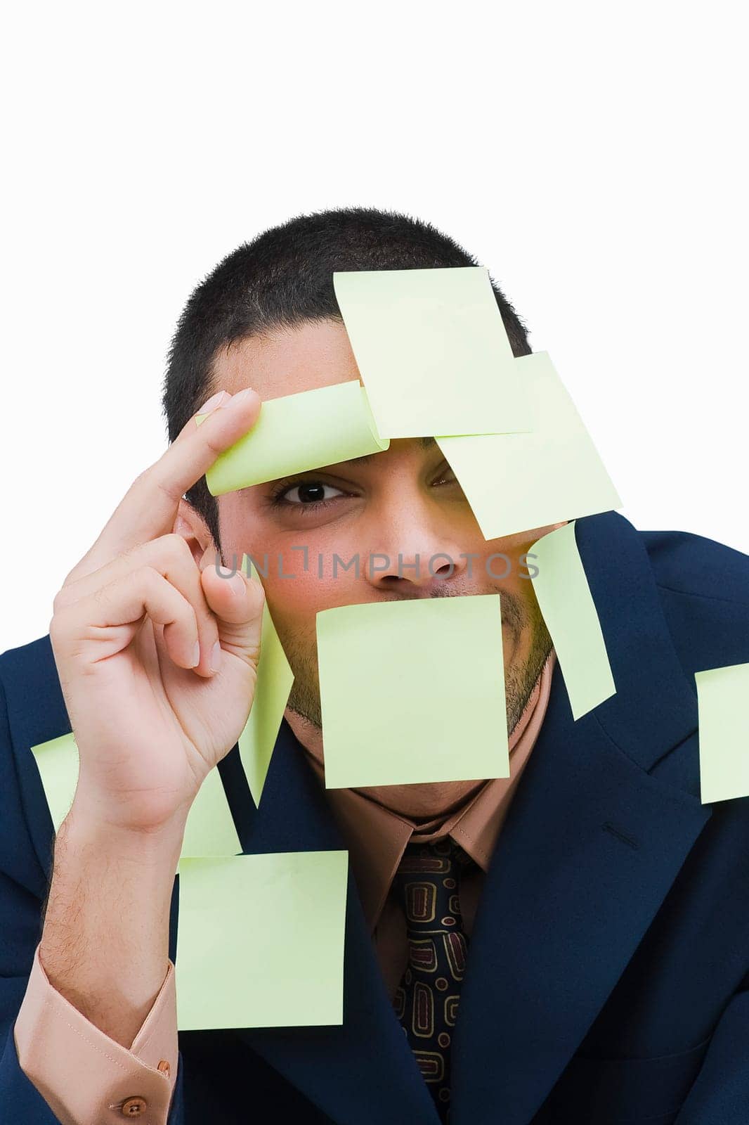 Portrait of a businessman covered with adhesive notes