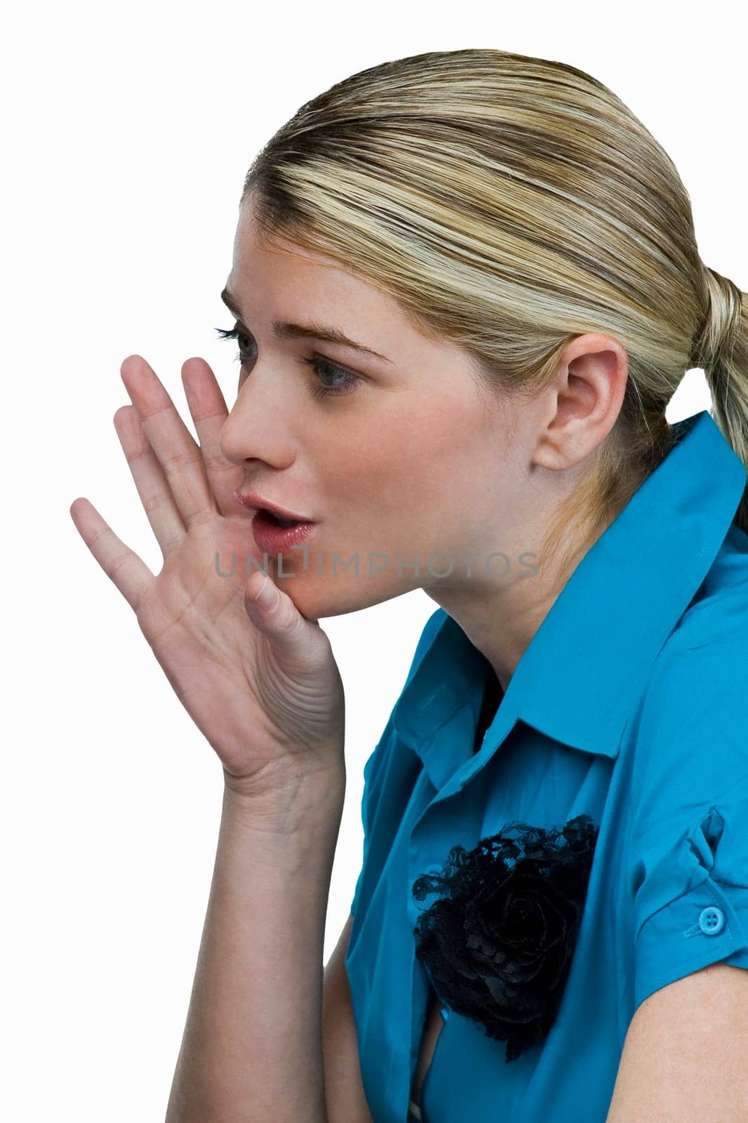 Close-up of a young woman whispering