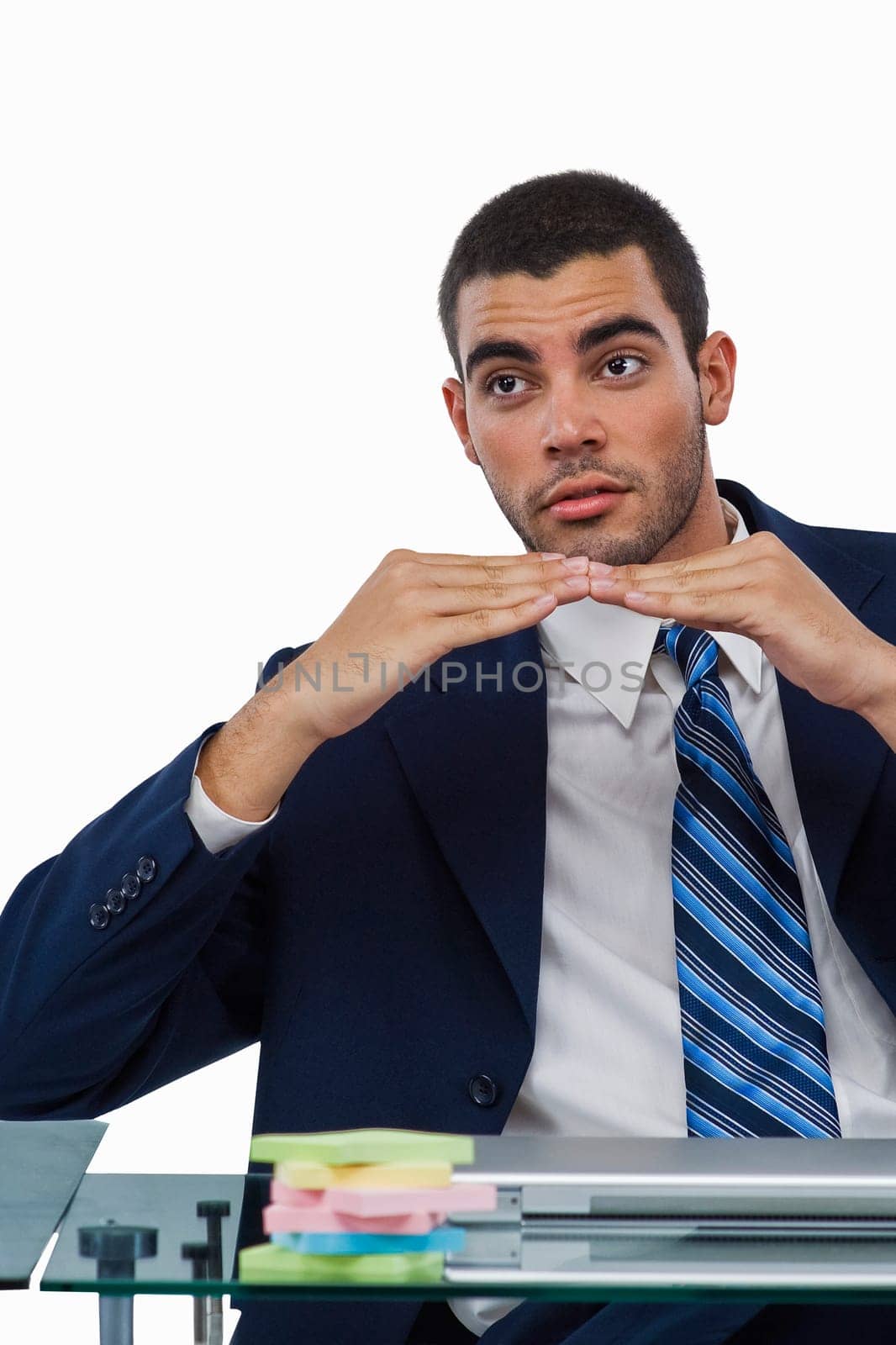 Businessman sitting at a desk and gesturing