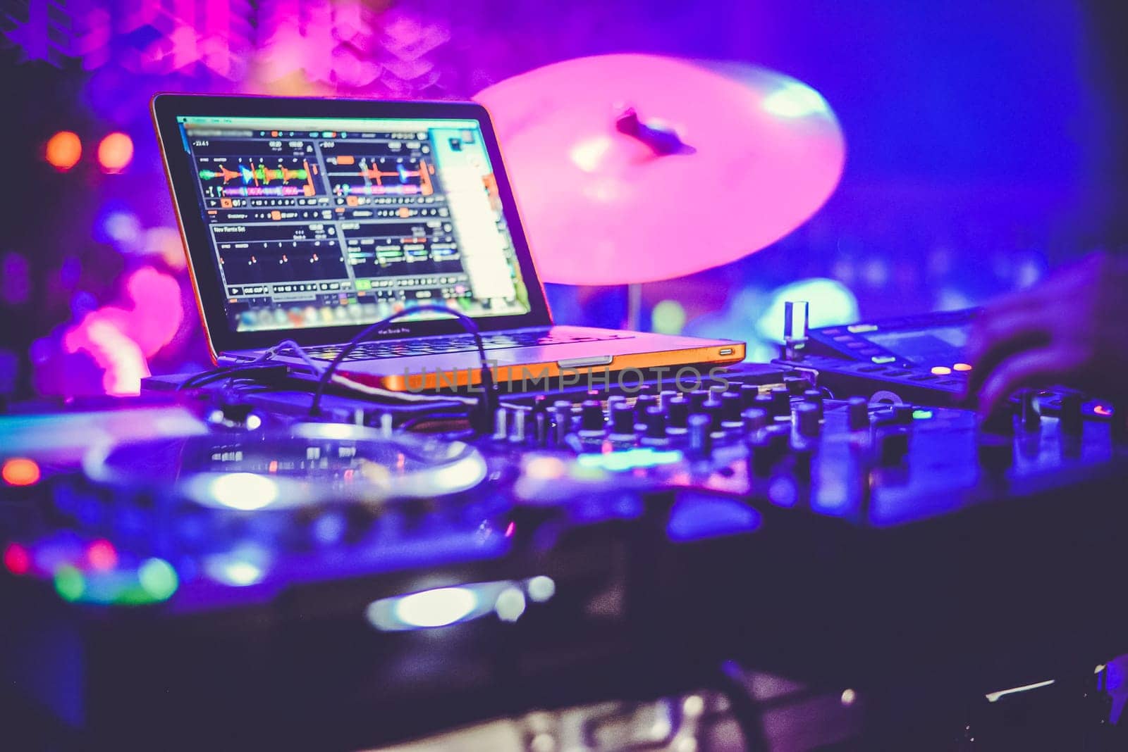 DJ at the remote control. Mixer remote at the concert. Musical equipment.