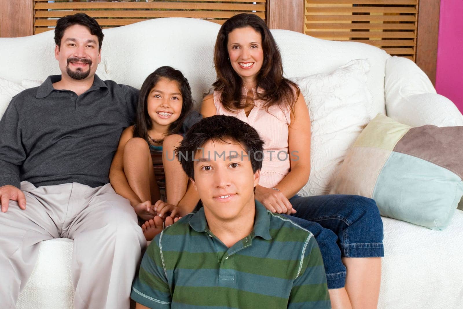 Portrait of a mid adult couple with their son and daughter