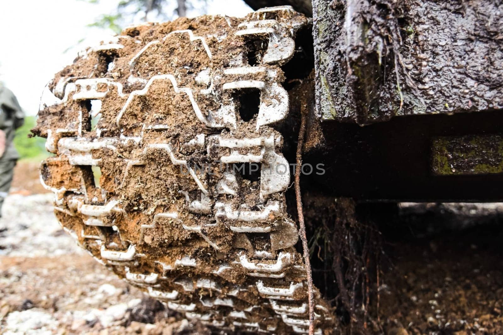 Tracked tractor. Dirt and damp Tracked tractor. Dirt and damp