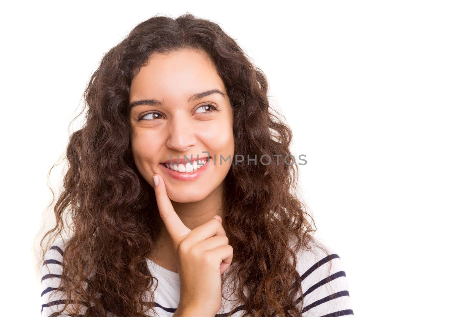 Studio shot: Young woman having a great idea