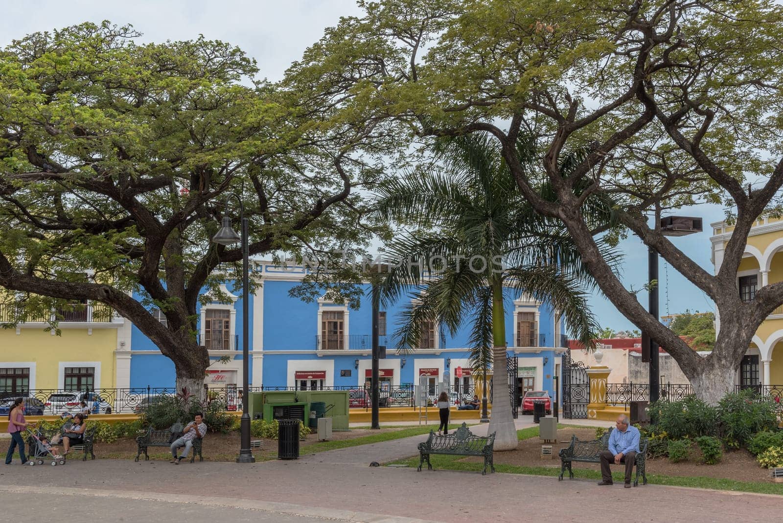 Unidentified people in the Independence Park (plaza) in Campeche, Mexico