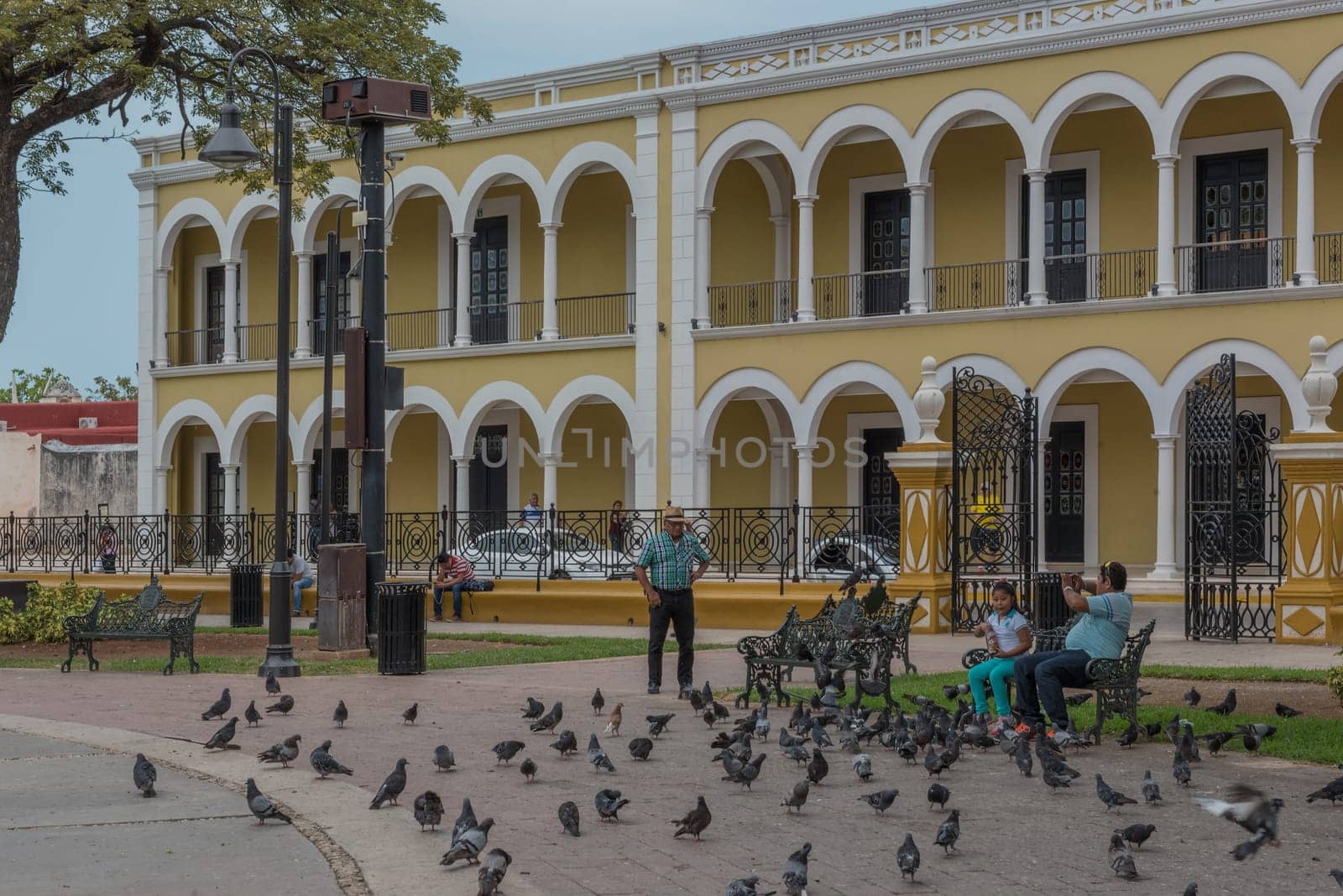 Unidentified people in the Independence Park (plaza) in Campeche, Mexico