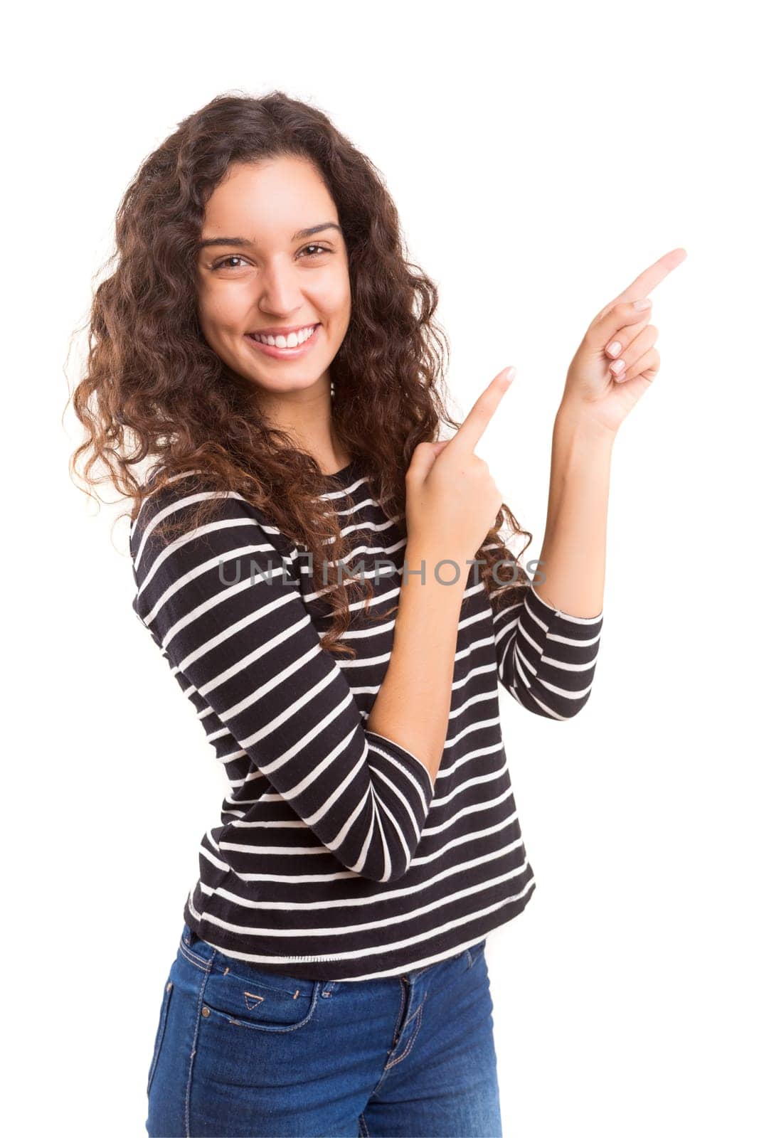 Young beautiful woman presenting your product, isolated over white background