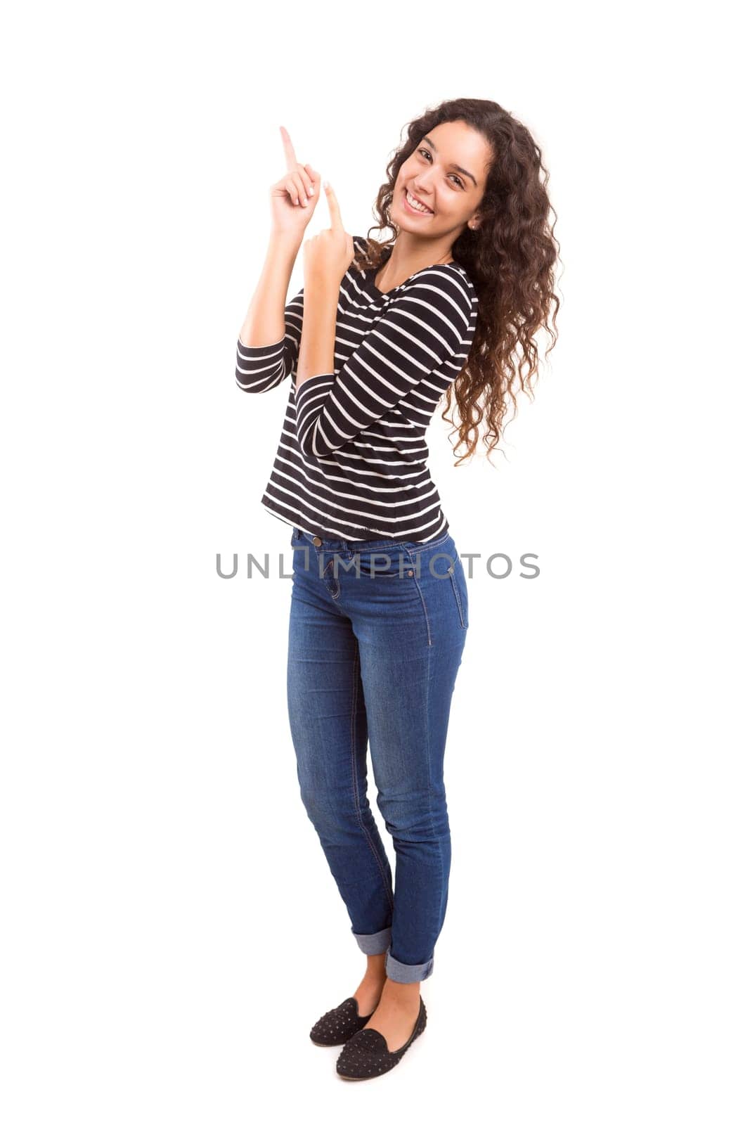 Young beautiful woman presenting your product, isolated over white background