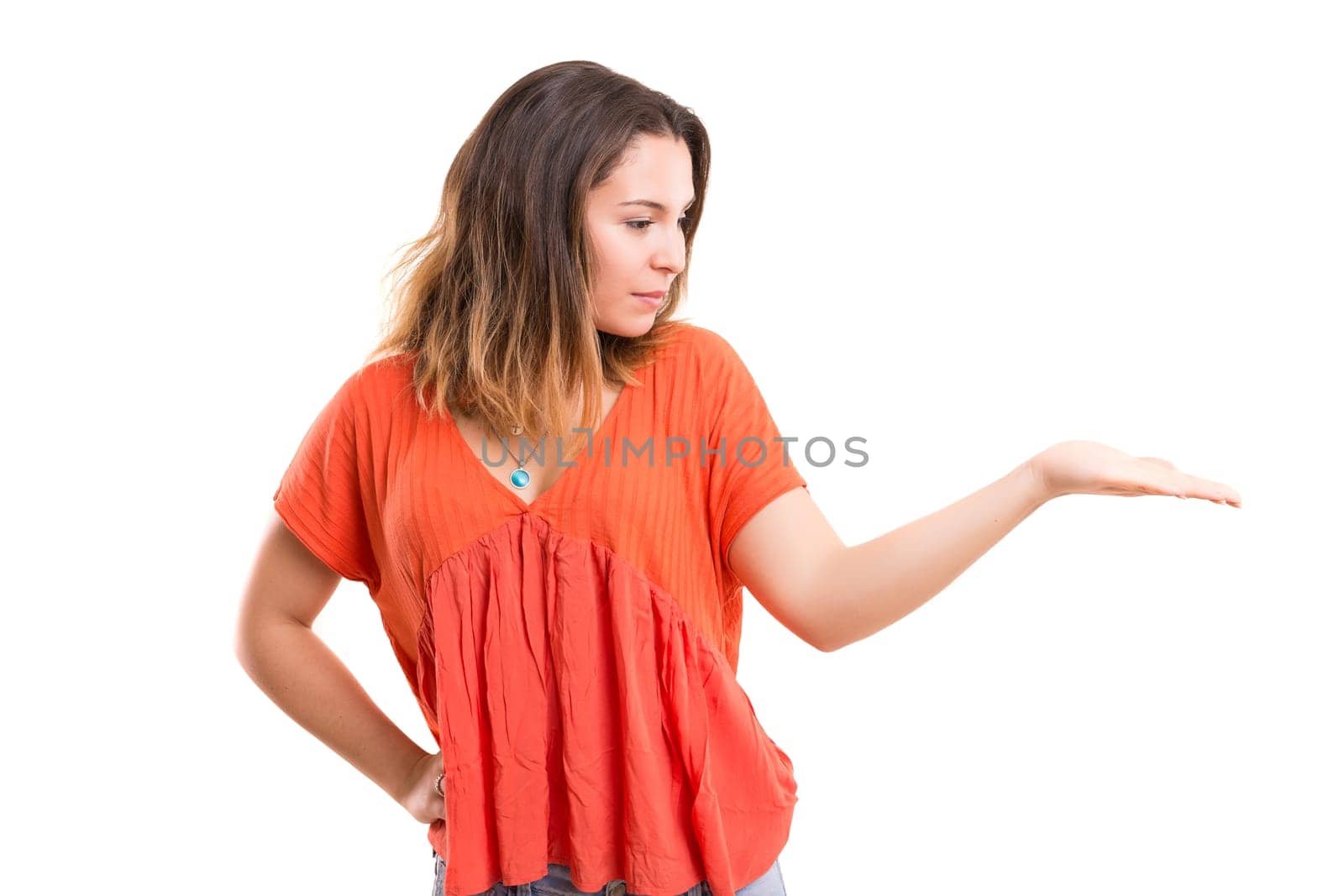 Young beautiful woman presenting your product, isolated over white background