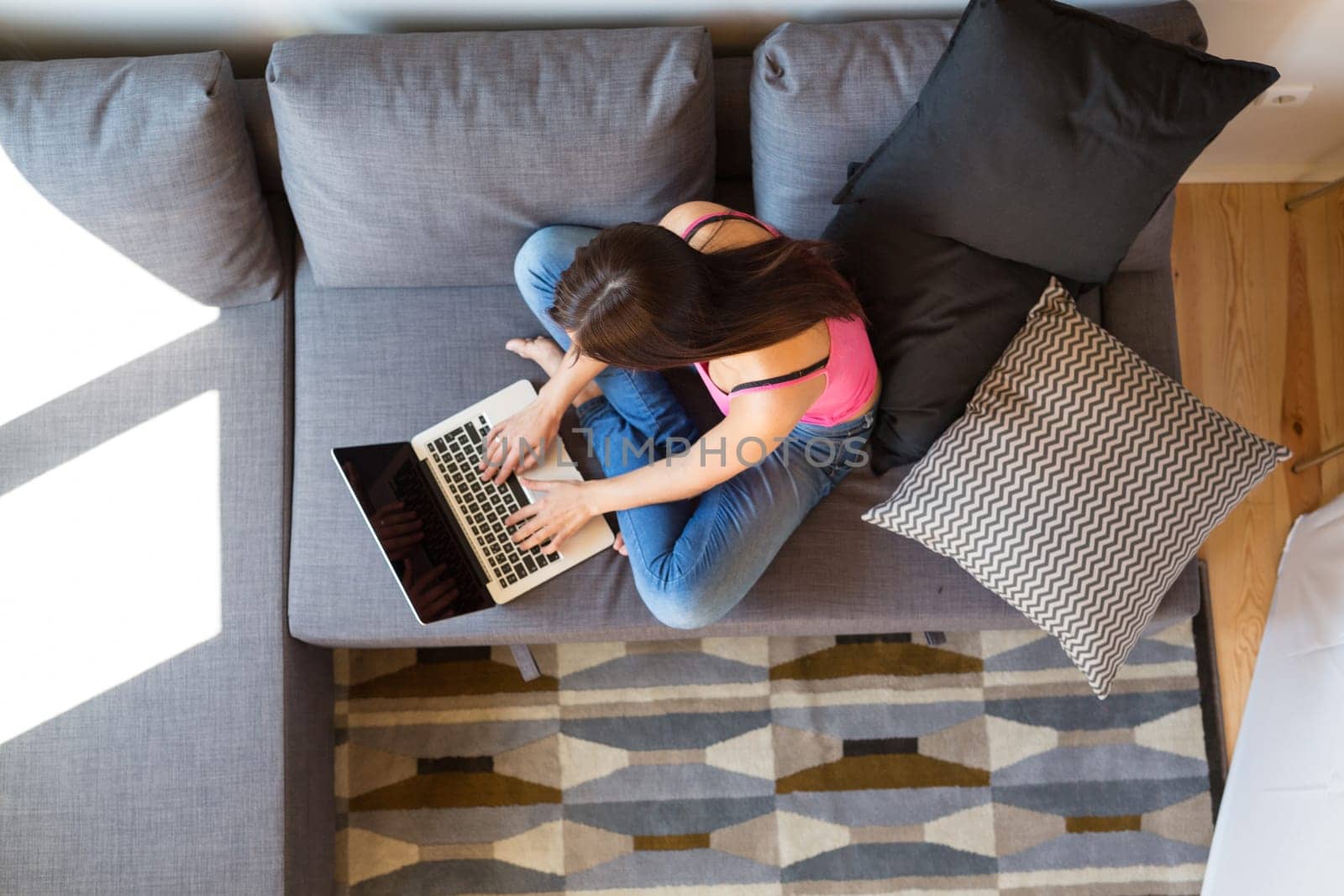 Beautiful woman relaxing with a computer