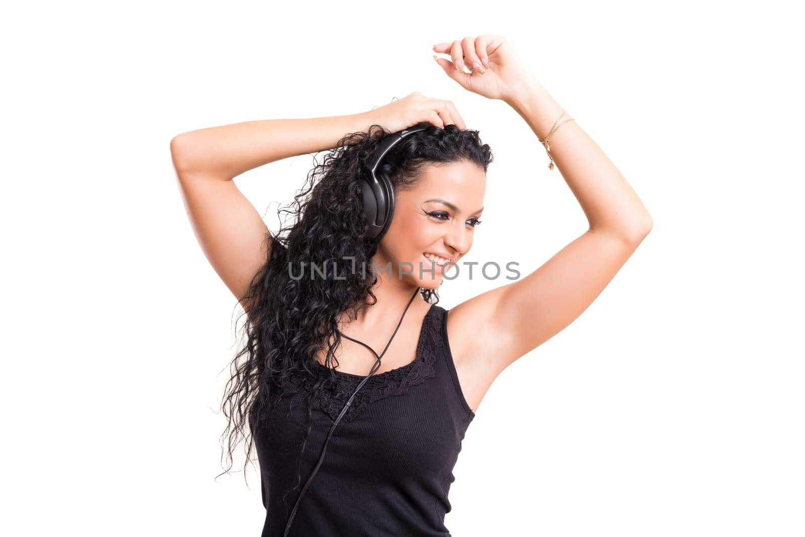 A Happy young woman listening to music