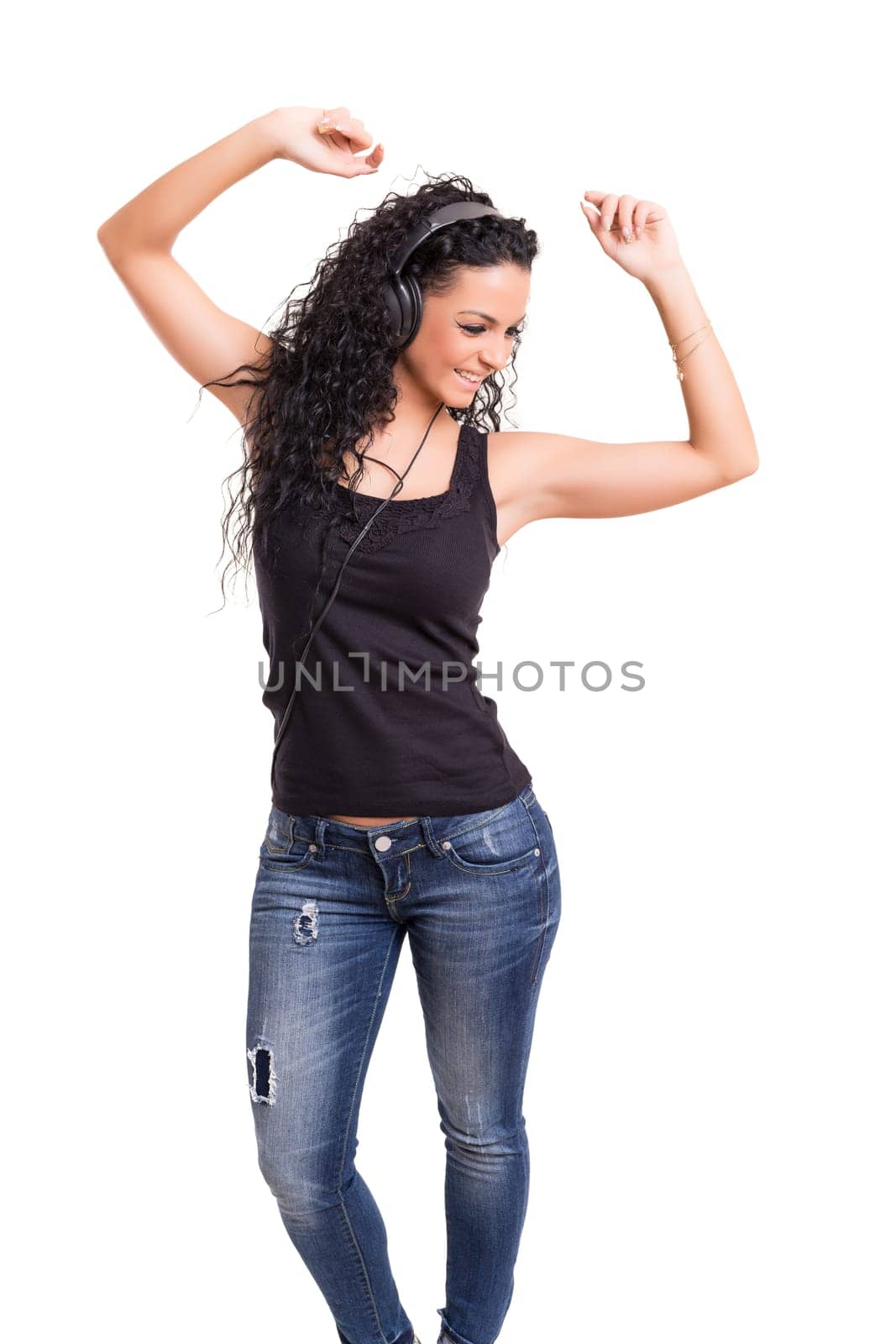 A Happy young woman listening to music