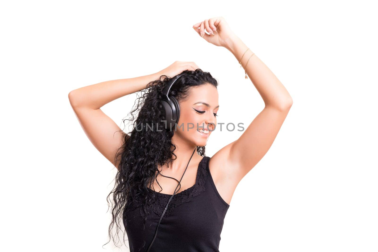A Happy young woman listening to music