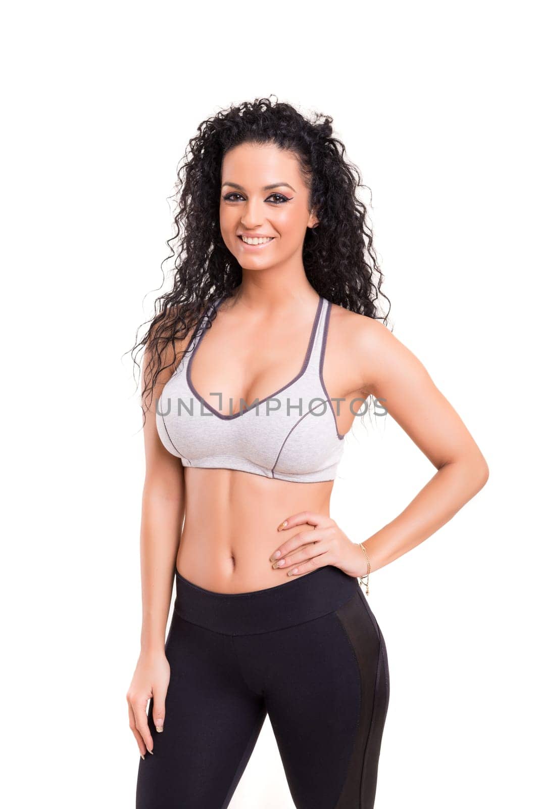 A beautiful young woman exercising - fitness concept