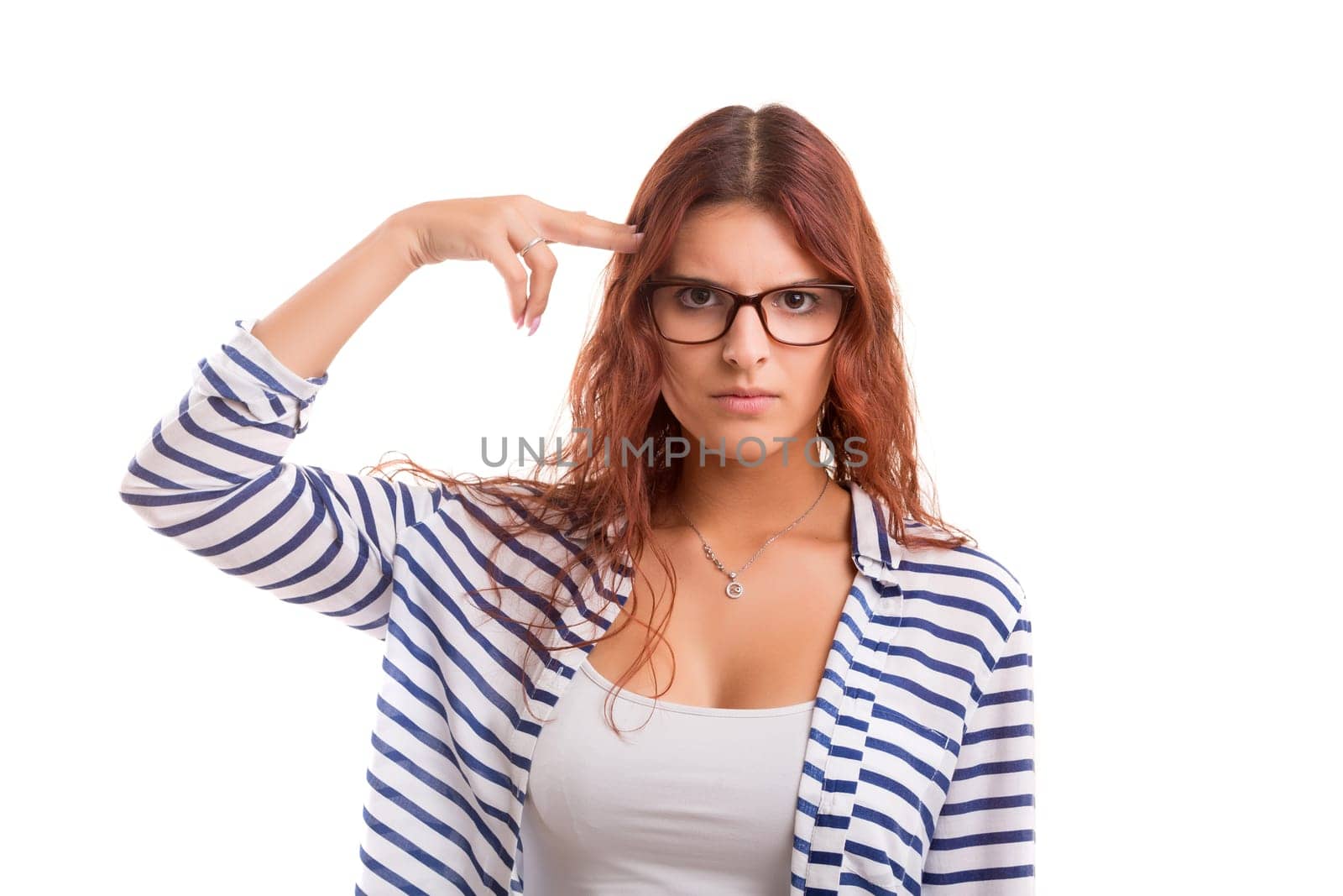 Young student tired of studying for the final exams, isolated over a white background