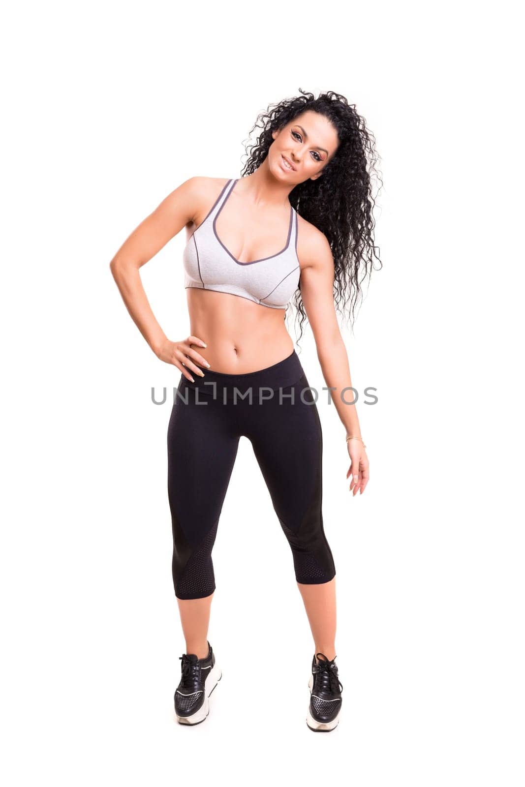 A beautiful young woman exercising - fitness concept