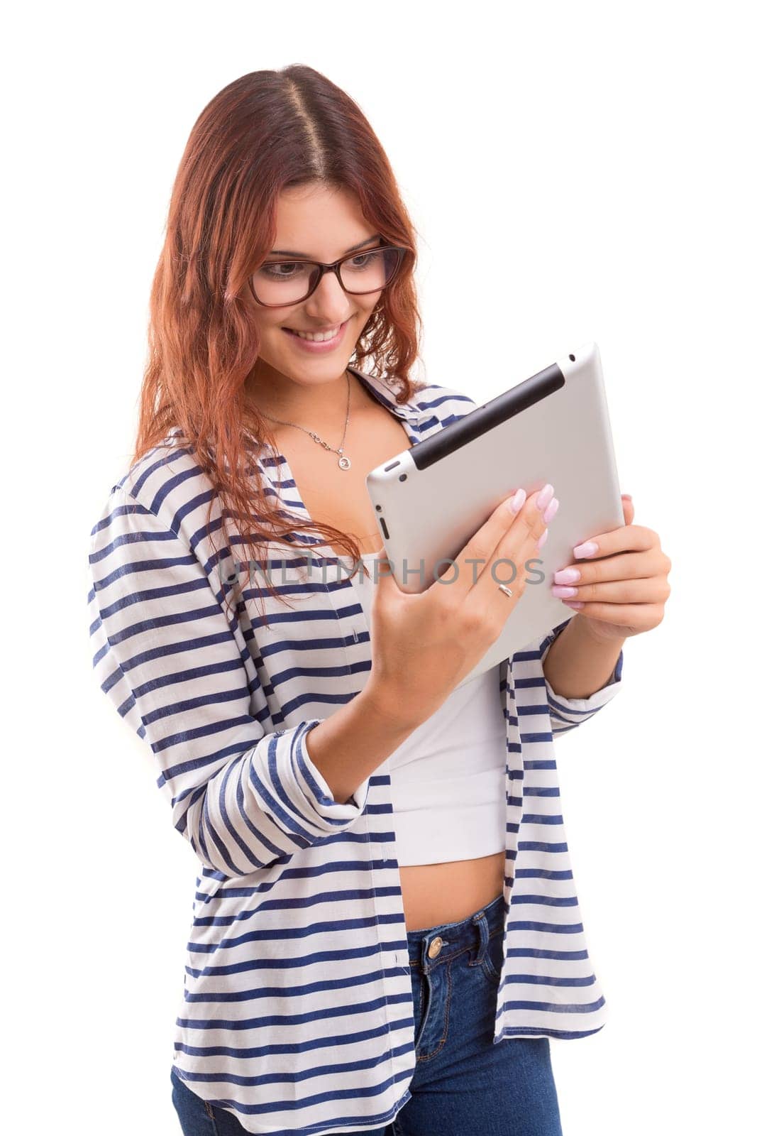 Beautiful woman relaxing with a tablet computer