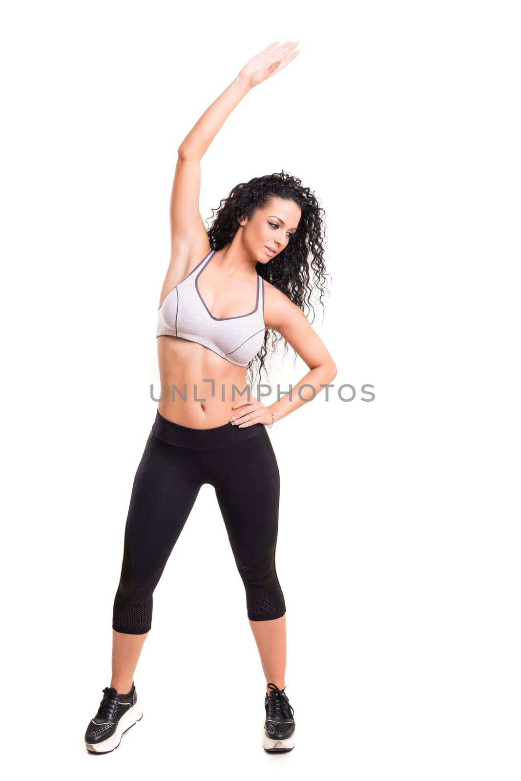A beautiful young woman exercising - fitness concept