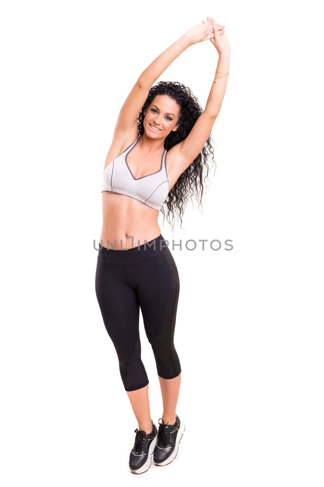 A beautiful young woman exercising - fitness concept
