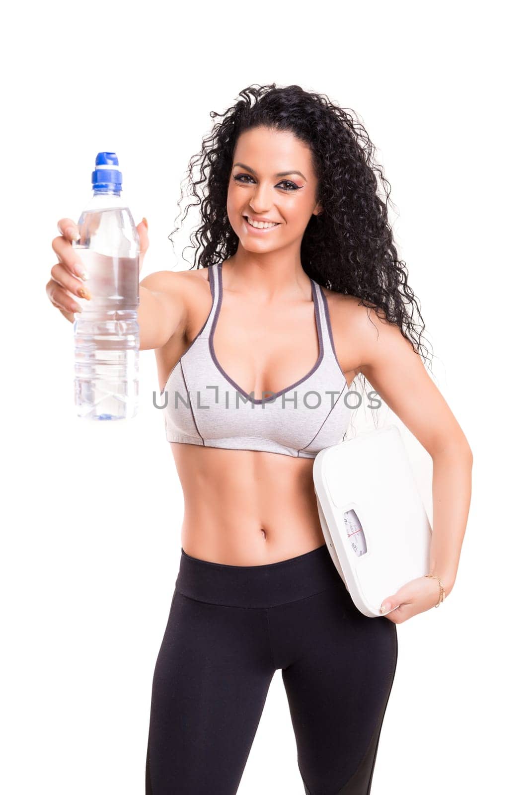 A beautiful young woman exercising - fitness concept
