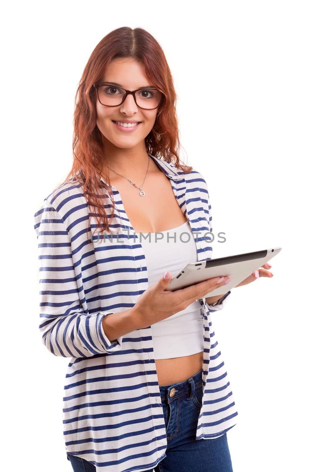 Beautiful woman relaxing with a tablet computer