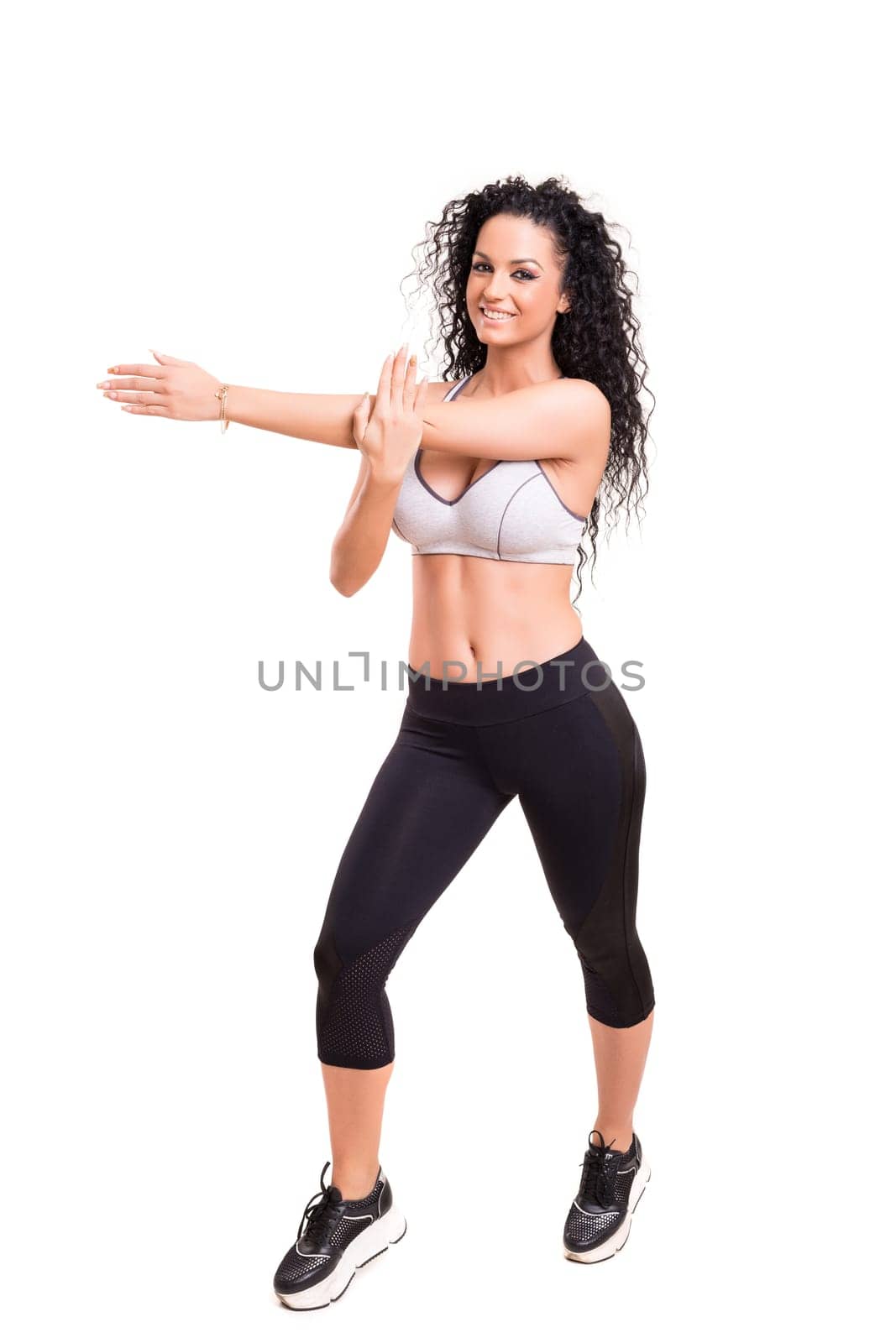 A beautiful young woman exercising - fitness concept