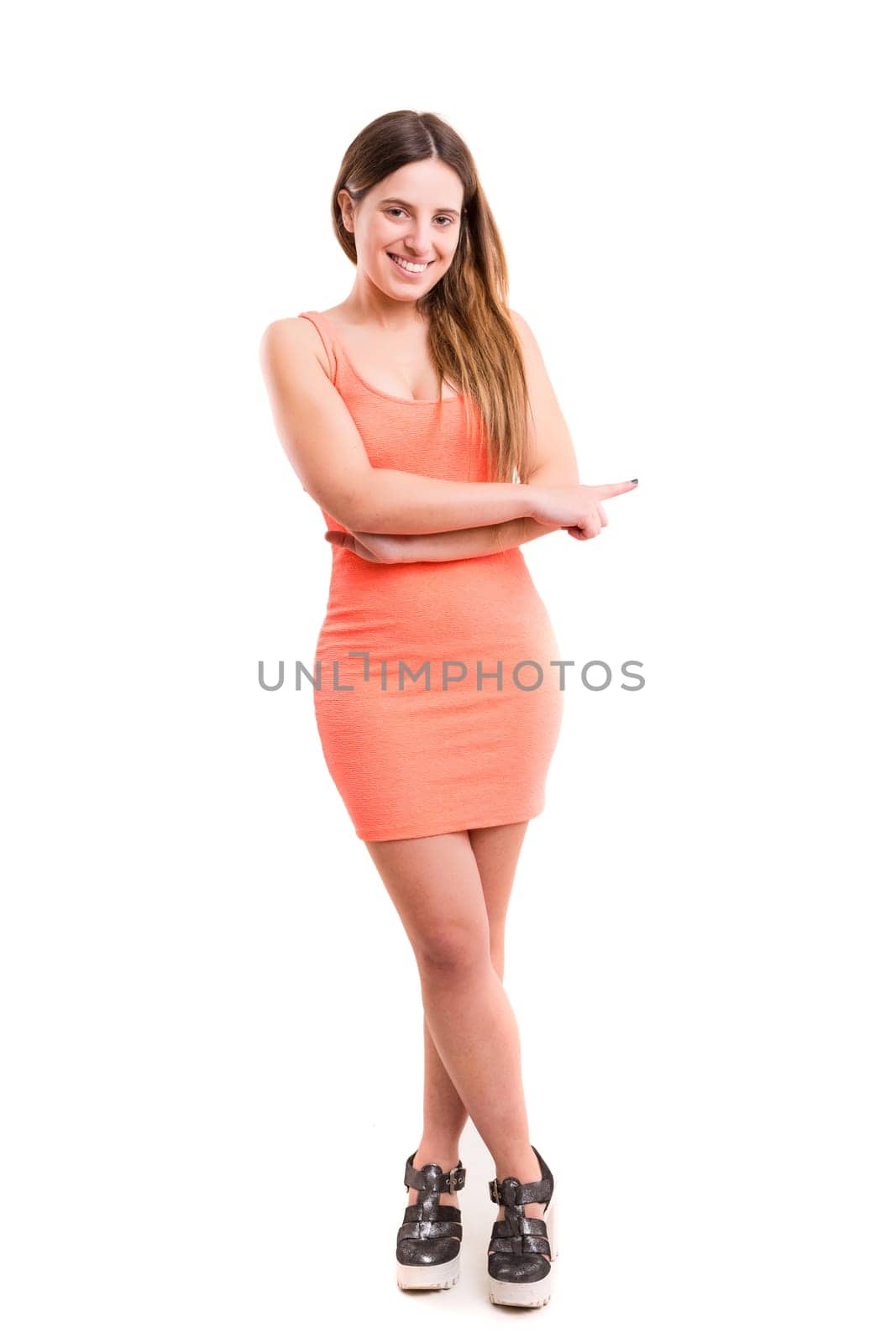 Young beautiful woman presenting your product, isolated over white background
