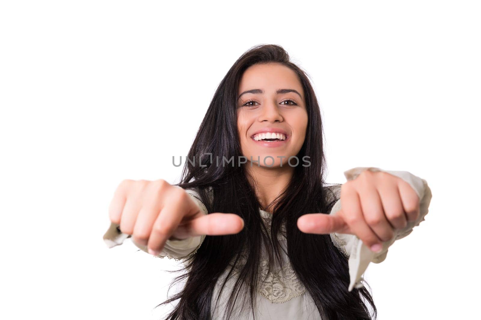 Beautiful young woman signaling ok, isolated over white