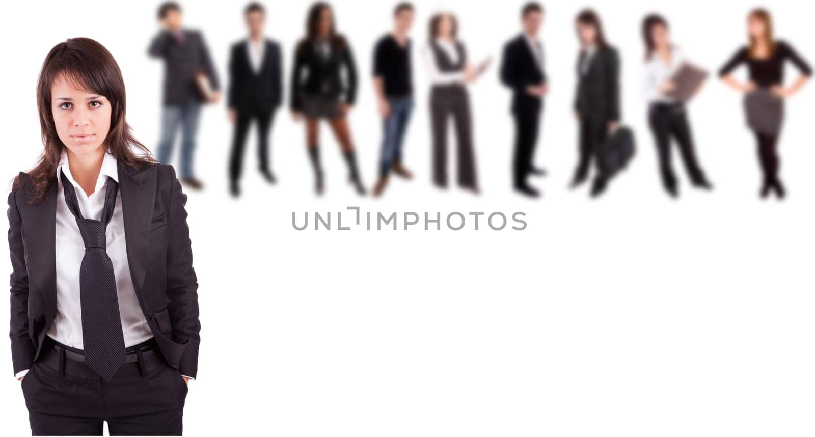 Business woman posing, with people in background