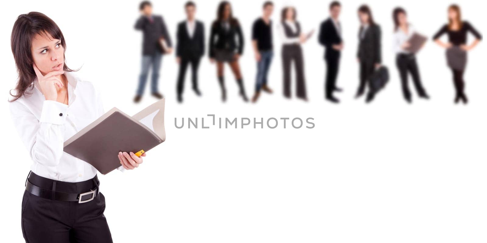 Business woman posing, with people in background