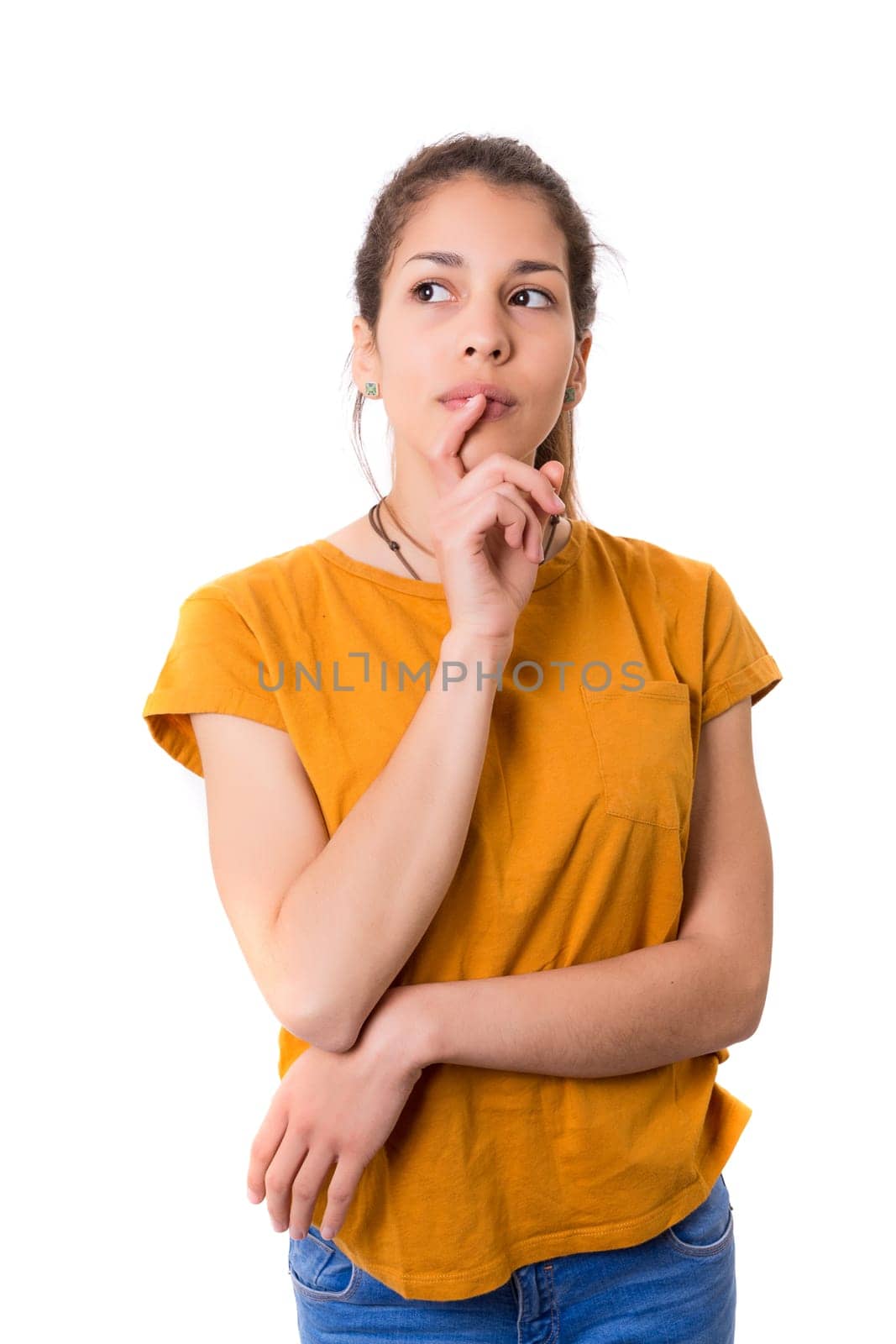 Studio shot: Young woman having a great idea