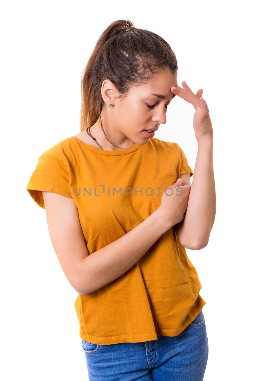 Young student tired of studying for the final exams, isolated over a white background