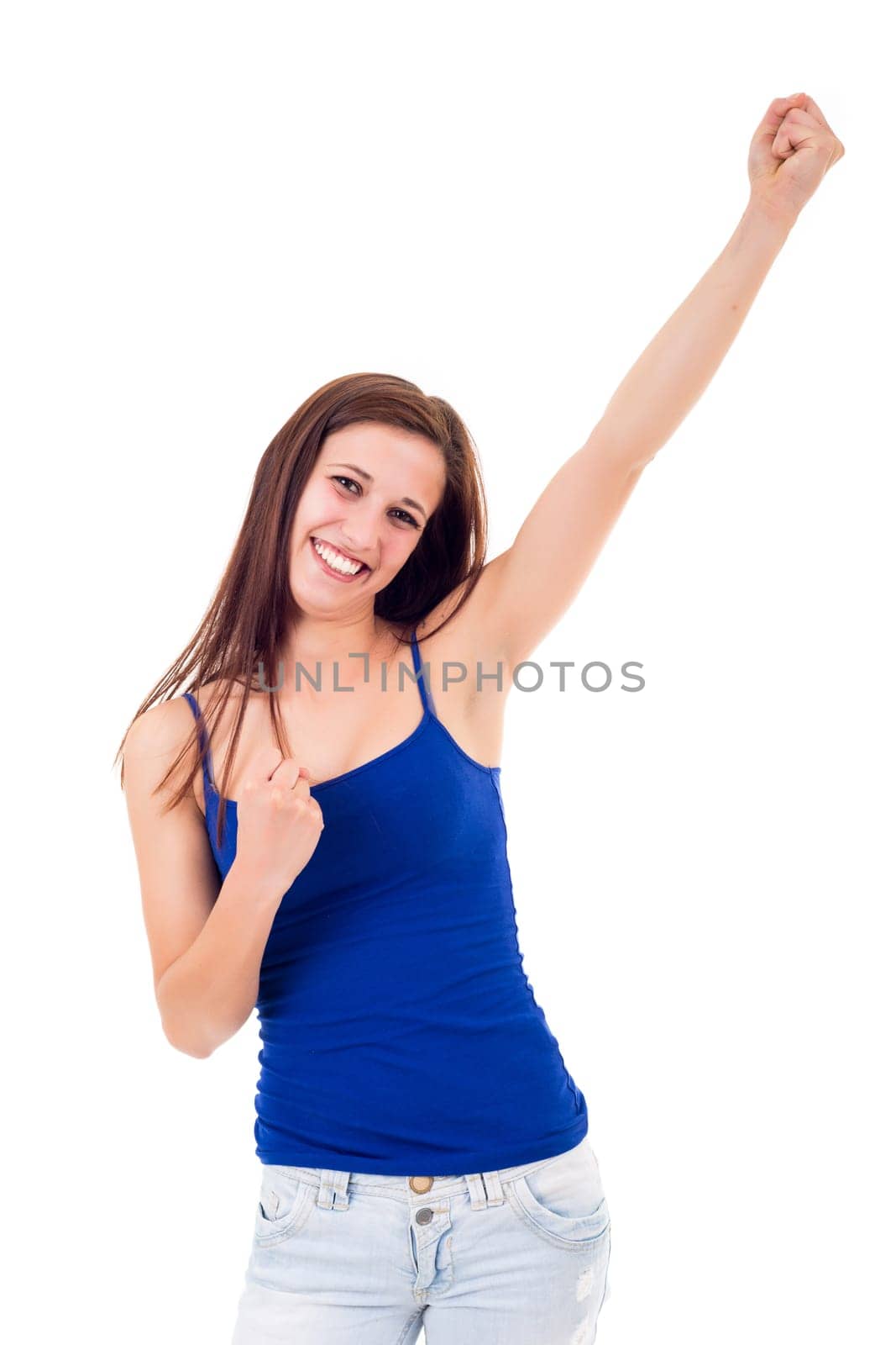Studio shot: Happy woman with raised arms