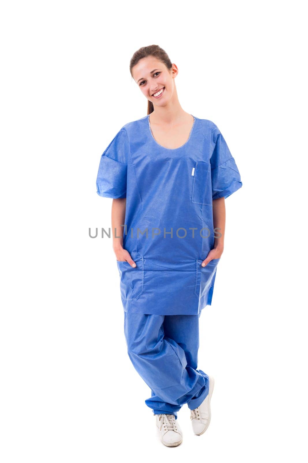 Beuatiful young nurse posing isolated over a white background