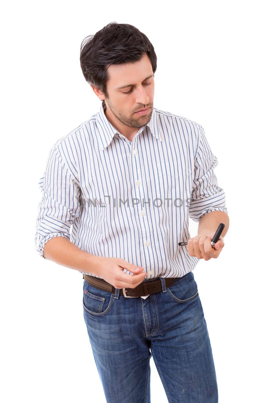 Young adult holding the keys of a new car