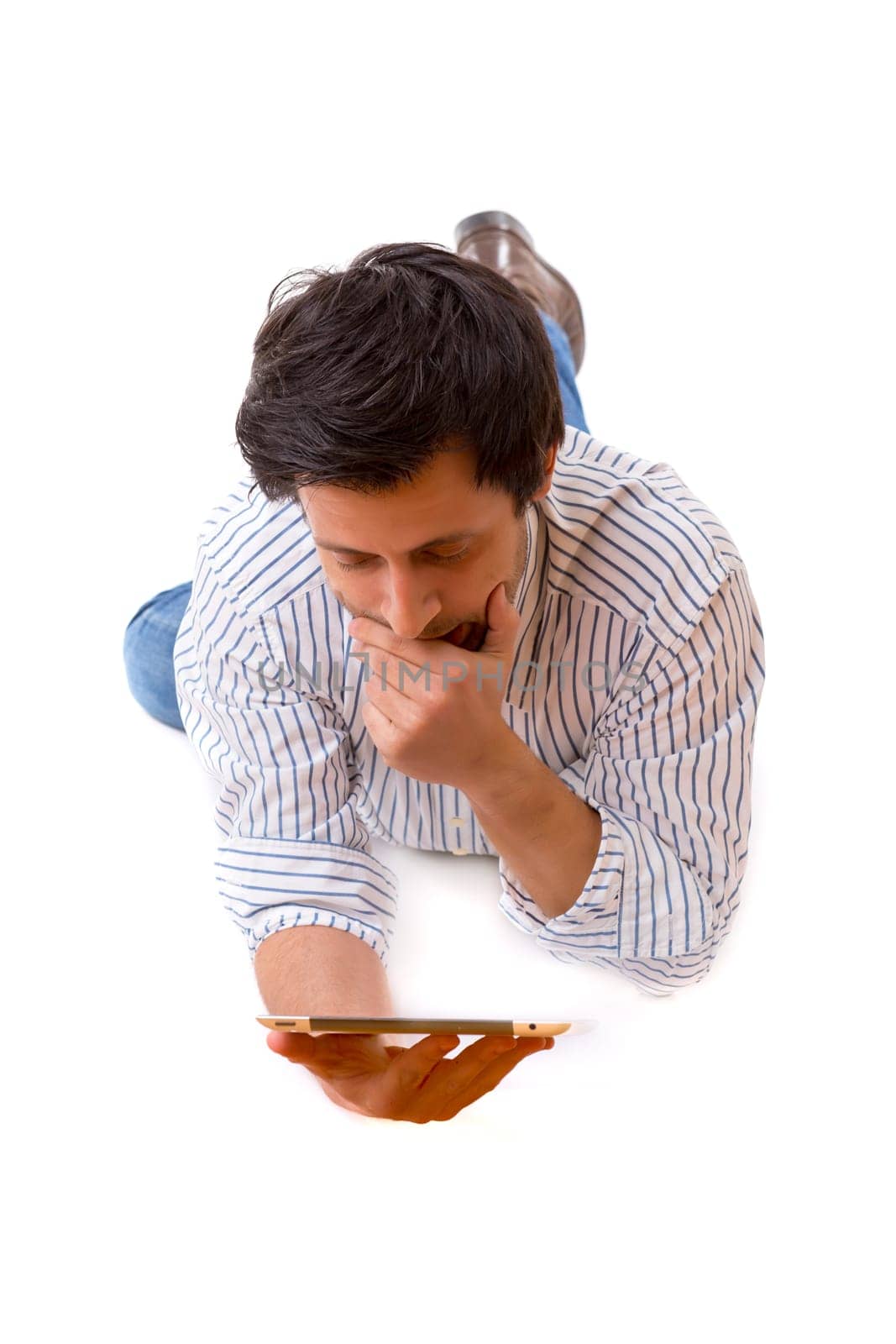 Handsome young man working with a tablet computer