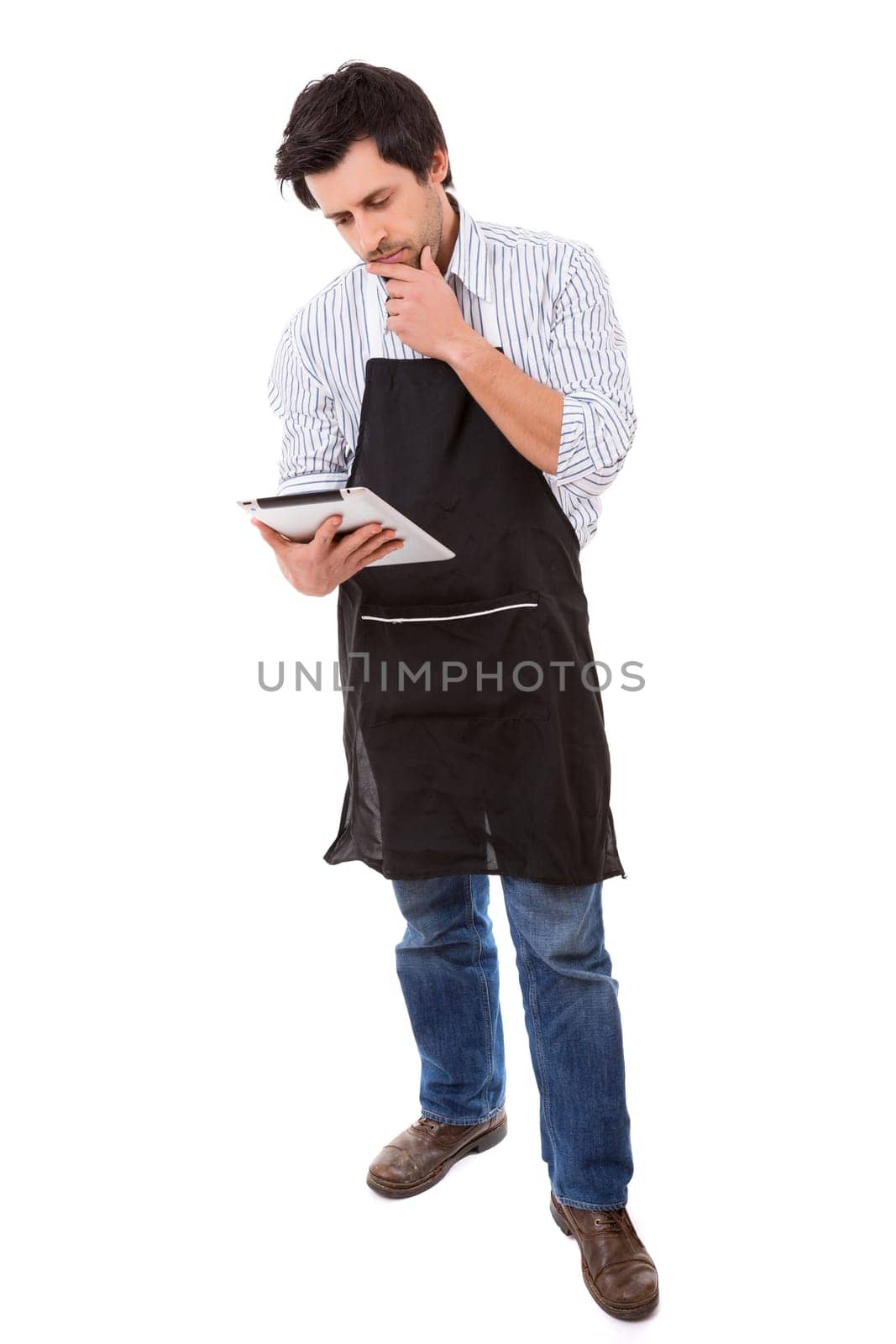 Young man searching for a new recipe over the internet