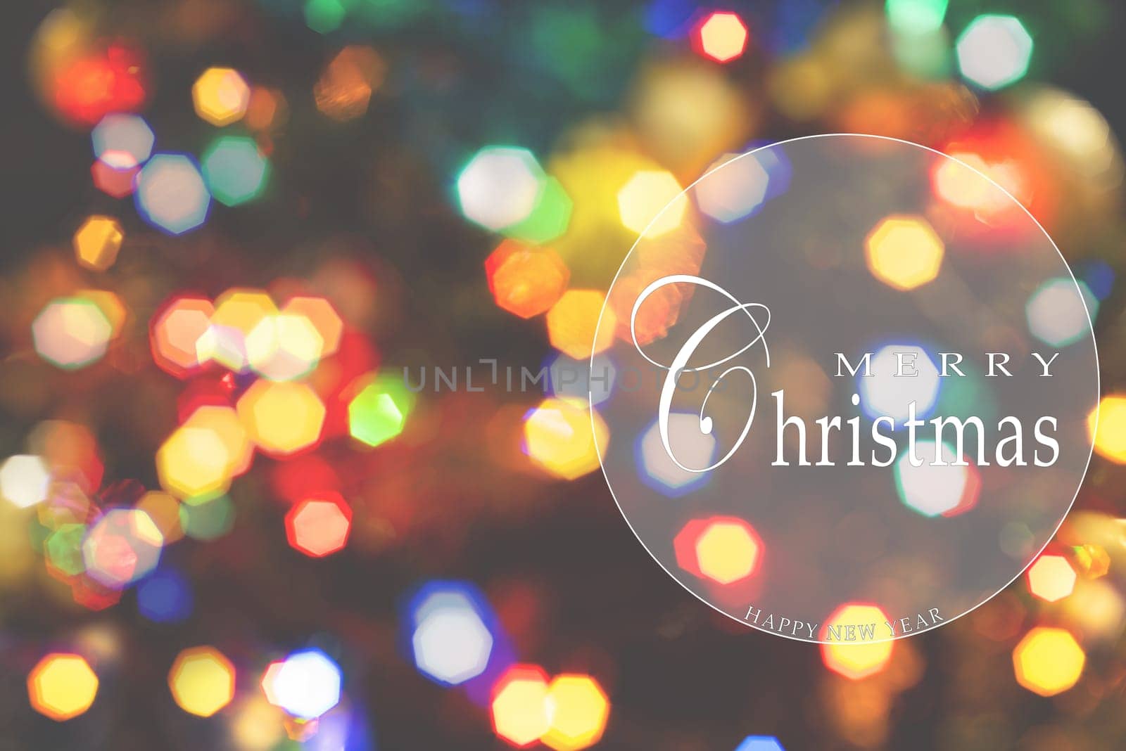 Merry Christmas and Happy New Year greeting card, blurred background of the twinkling lights of the Christmas tree. Greeting card background.