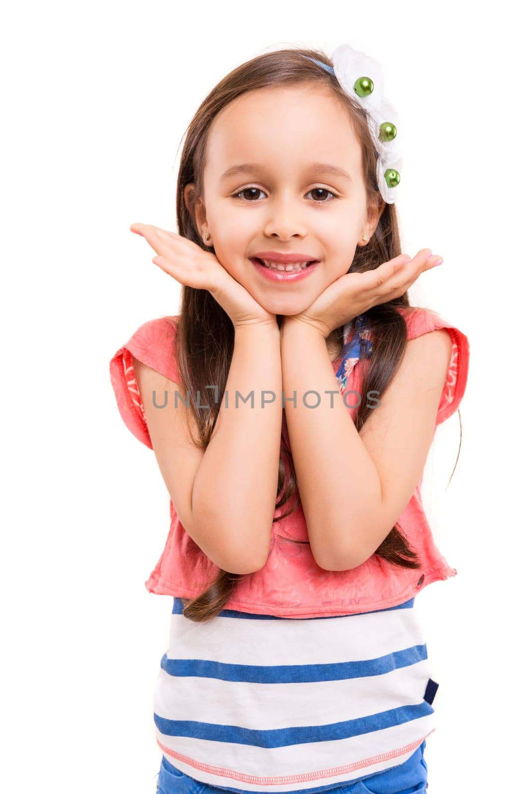 Beautiful young girl posing isolated over white