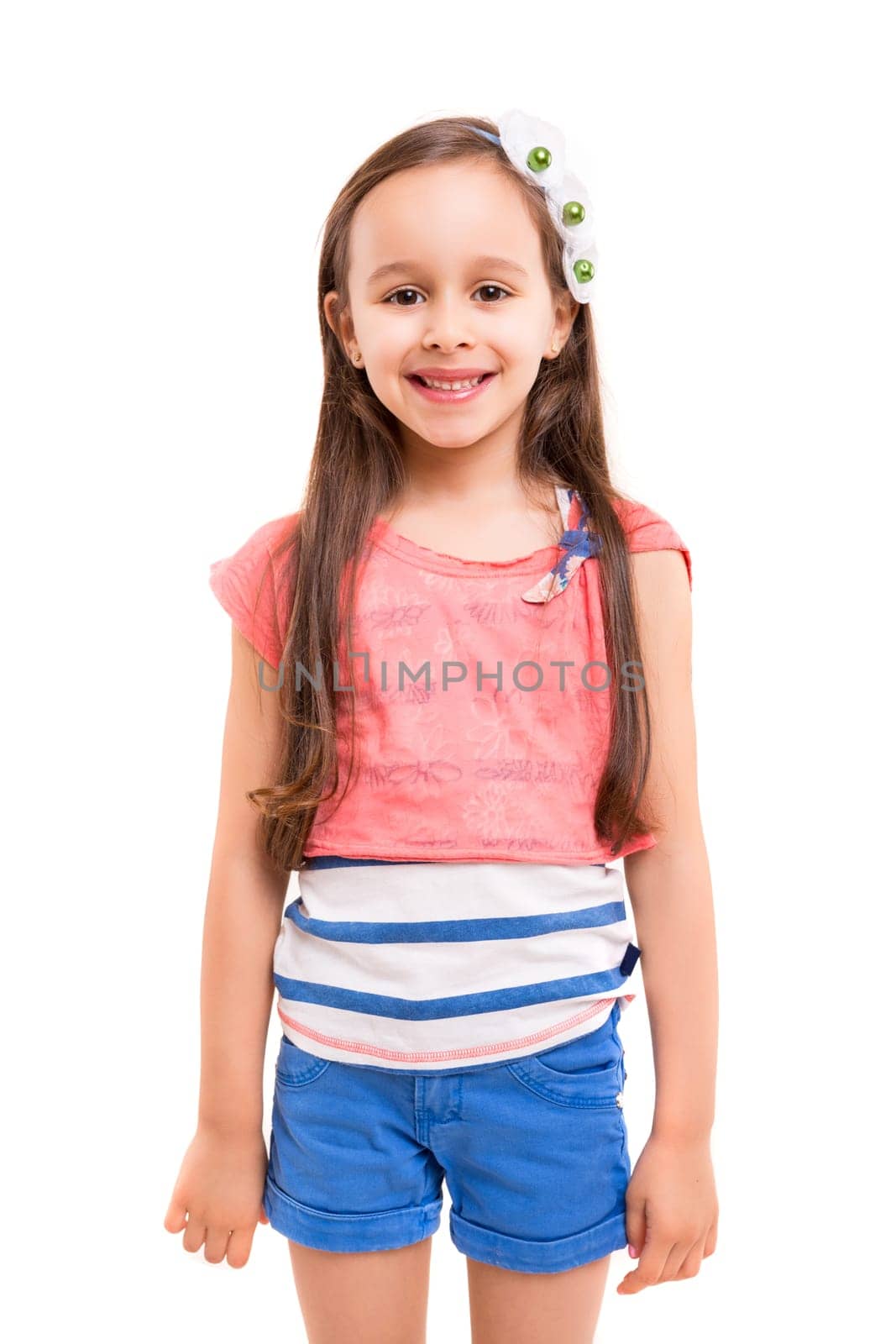 Beautiful young girl posing isolated over white