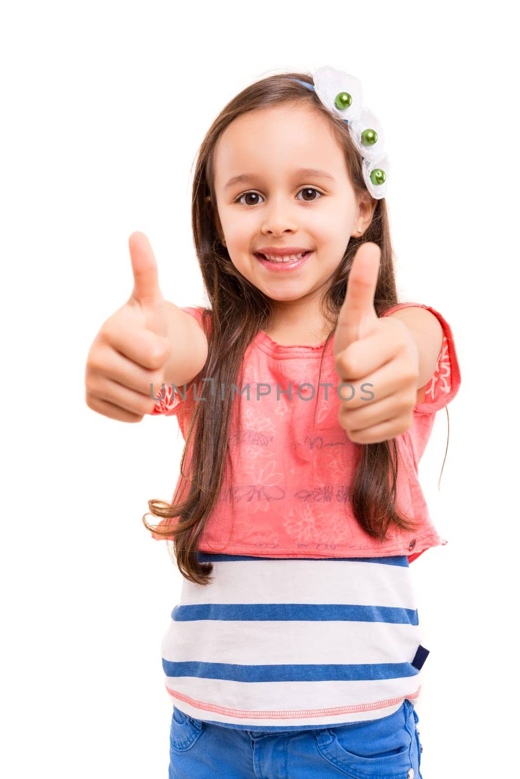 Small girl showing thumbs up, isolated over white background