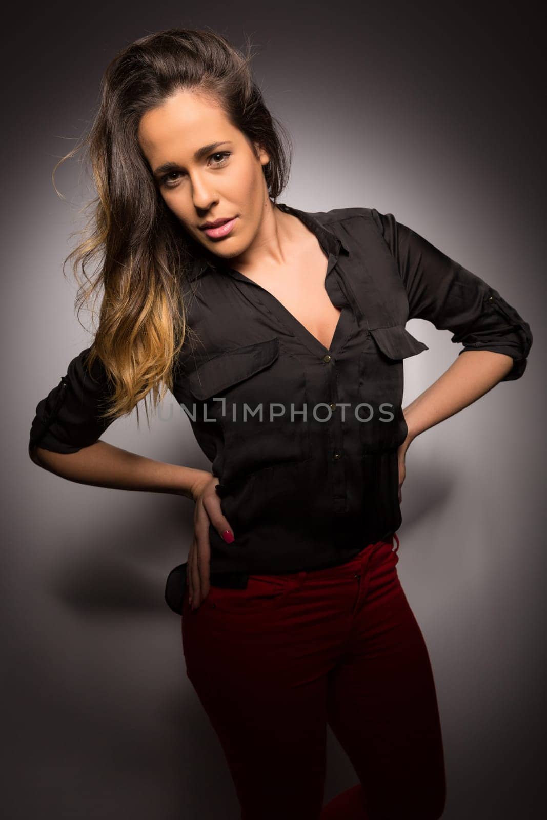 Sensual studio shot of a beautiful young woman