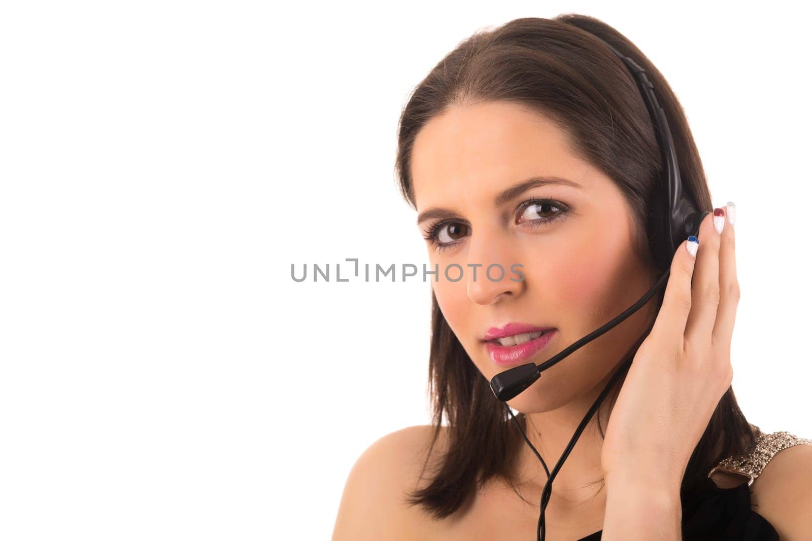 Friendly young beautiful telephone operator at work
