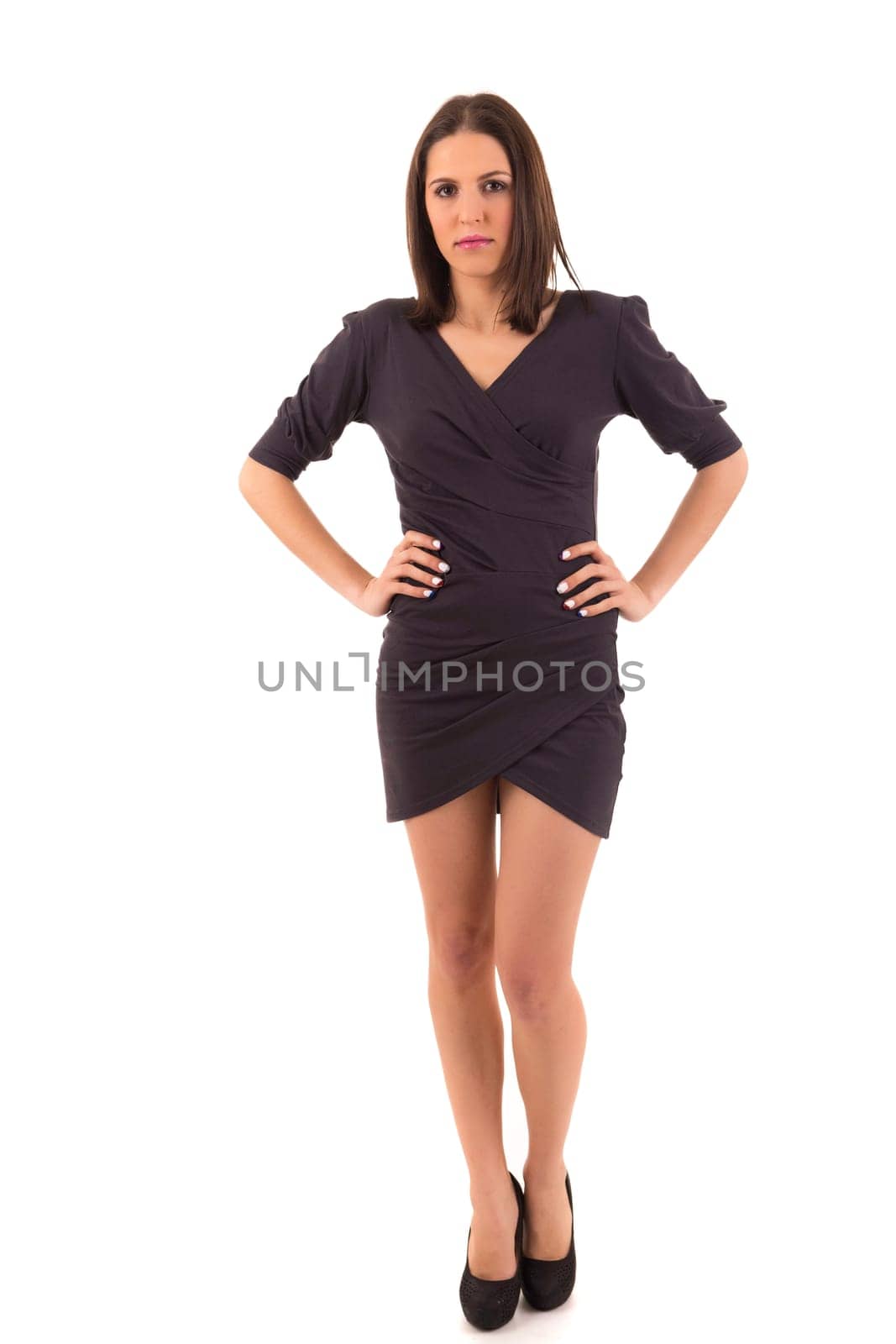 Beautiful young business woman posing isolated over white