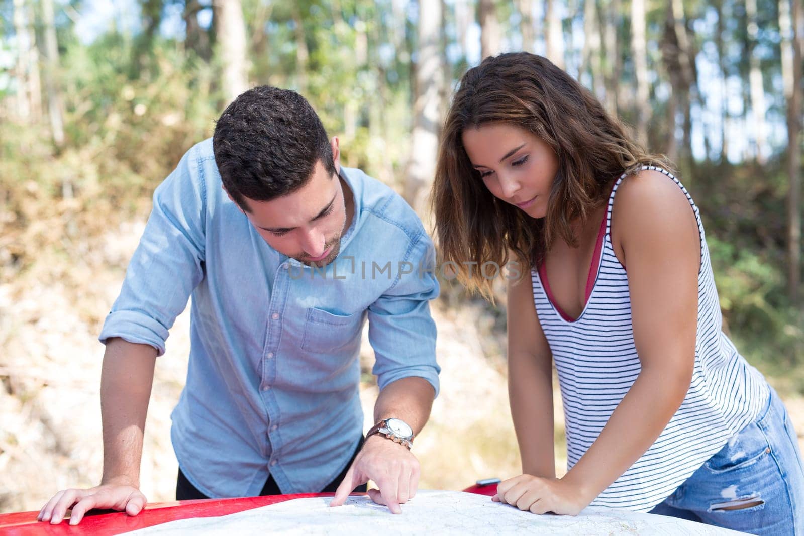 Young couple on roadtrip through countryside