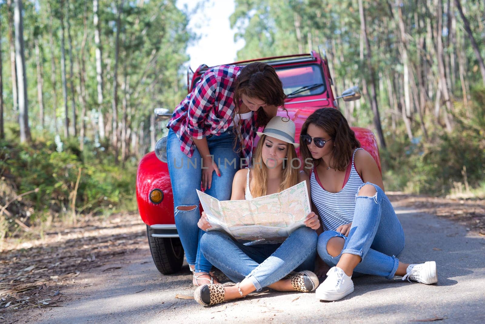 Group of friends on a roadtrip through countryside