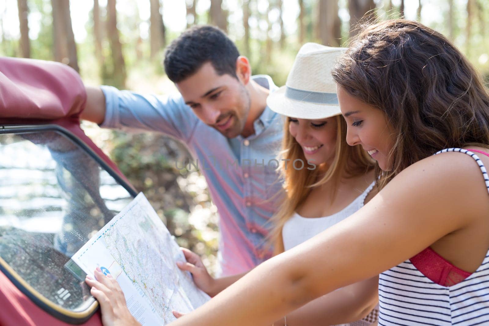 Group of friends on a roadtrip through countryside
