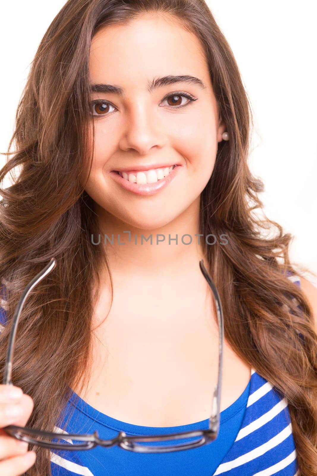 Young student woman posing over white background