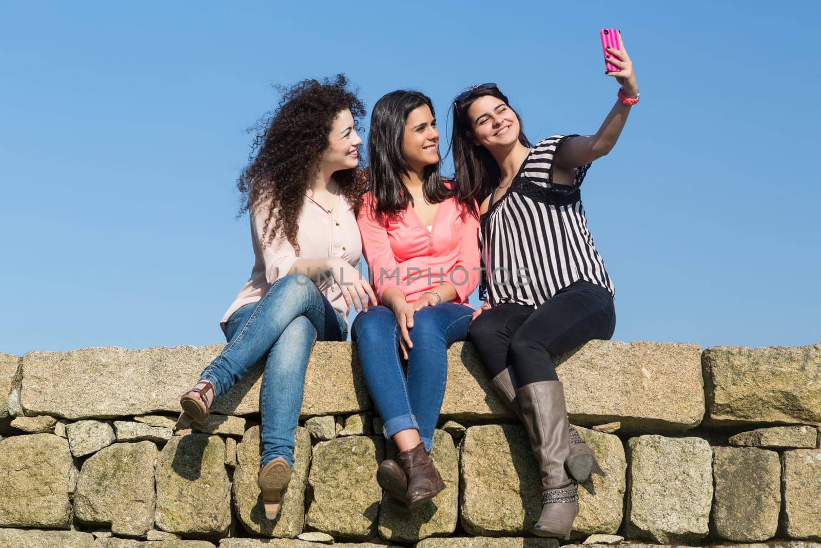 A group of students relaxing at the park