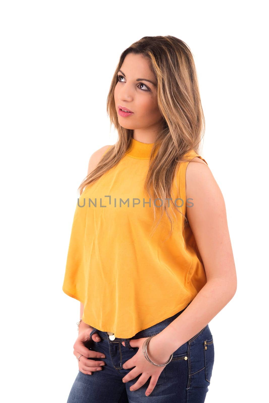 Young student woman posing over white background