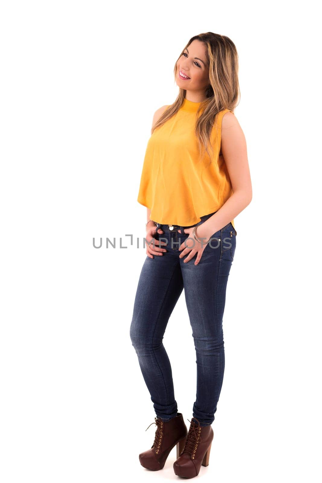 Young student woman posing over white background